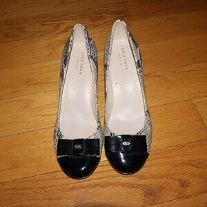 Cole Hann high heeled wedge; snake skin; bows on the front